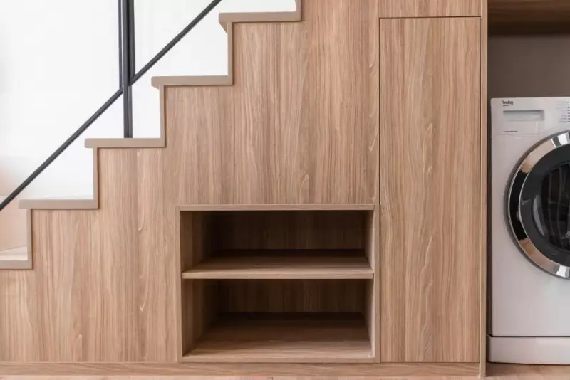 Bespoke under stairs storage cabinets by Callyn Carpentry & Joinery Surrey